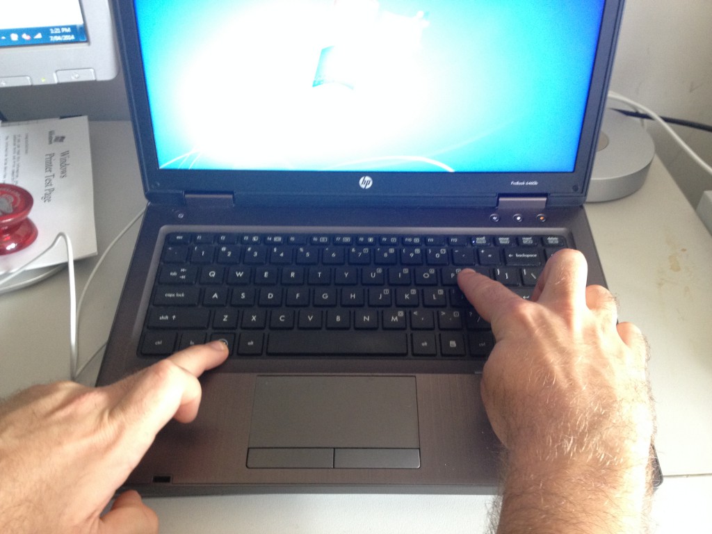 Picture shows user how to use the Windows P keyboard shortcut.